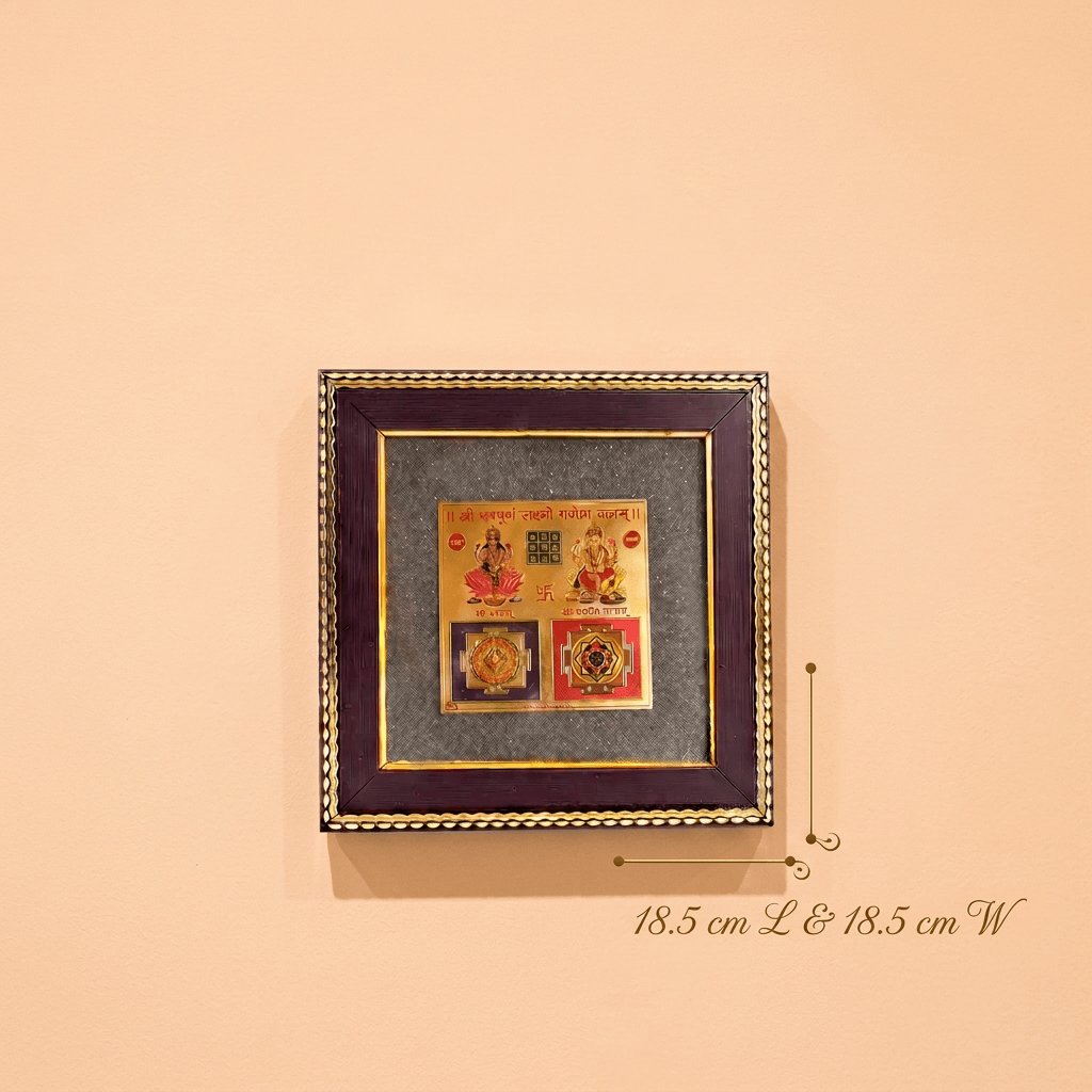 Elegant pyrite dust frame featuring Goddess Lakshmi and Lord Ganesha yantra design for spiritual wall decor.